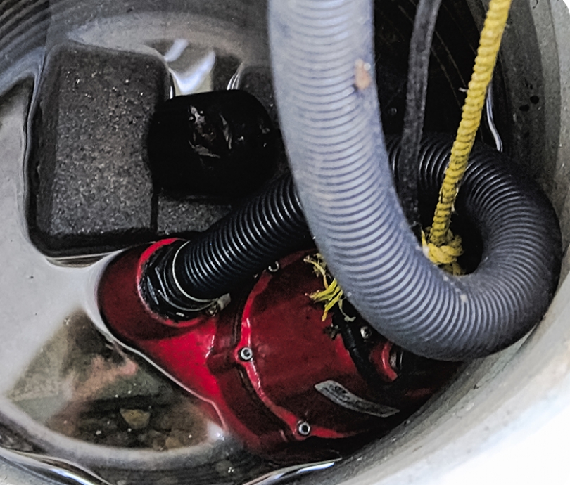 sump-pump-and-pit-wet-basement-installation-b